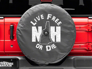 tire cover that says “Live free or die” with a backup camera hole