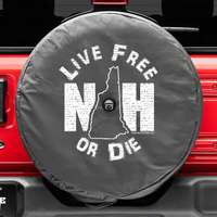 tire cover that says “Live free or die” with a backup camera hole