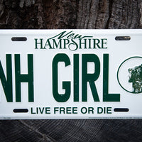 new hampshire license plate with nh girl inscription
