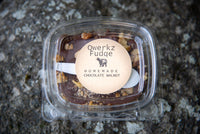 box of Qwerkz chocolate walnut fudge with a spoon in the package
