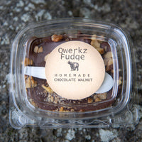 box of Qwerkz chocolate walnut fudge with a spoon in the package