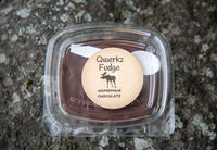 box of Qwerkz chocolate fudge with a spoon in the package
