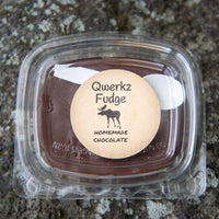 box of Qwerkz chocolate fudge with a spoon in the package