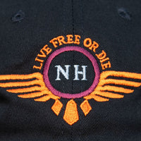 close up image of the live free or die wings logo