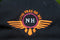 close up image of the live free or die wings logo