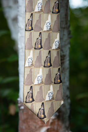  tan necktie with New Hampshire themed old man of the mountain design